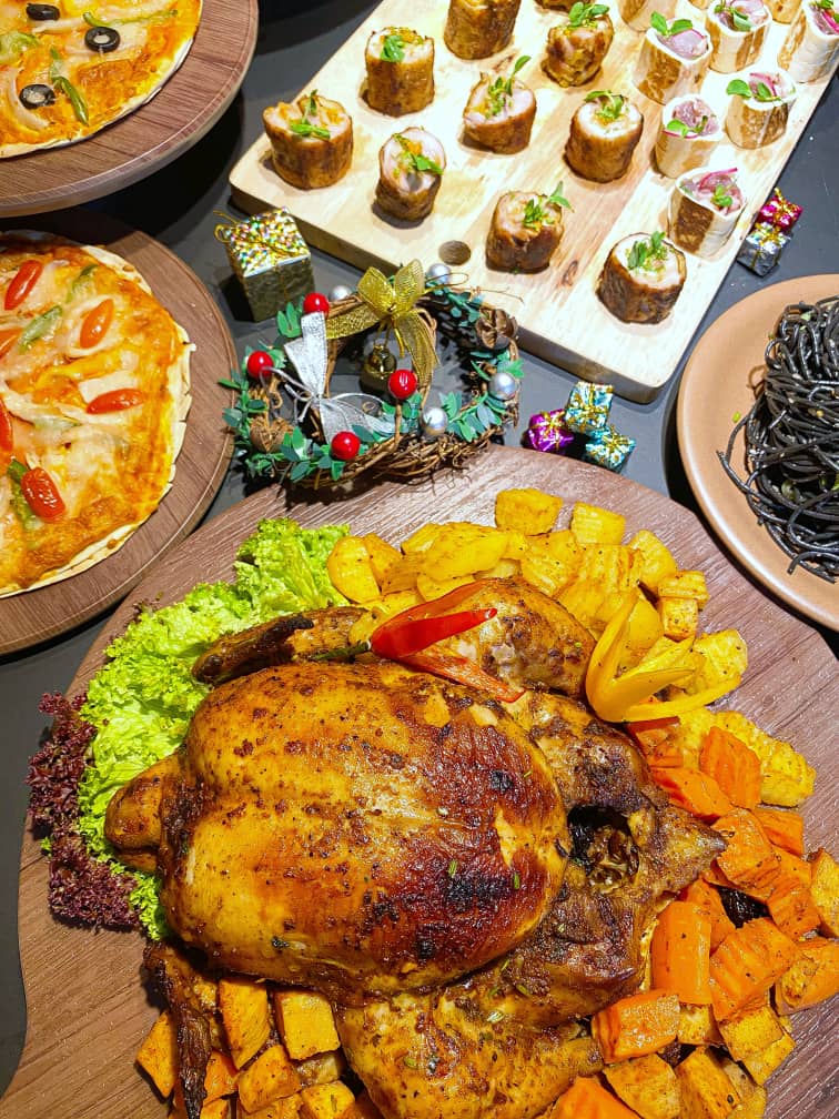 catering fried turkey and pizza with christmas ornaments