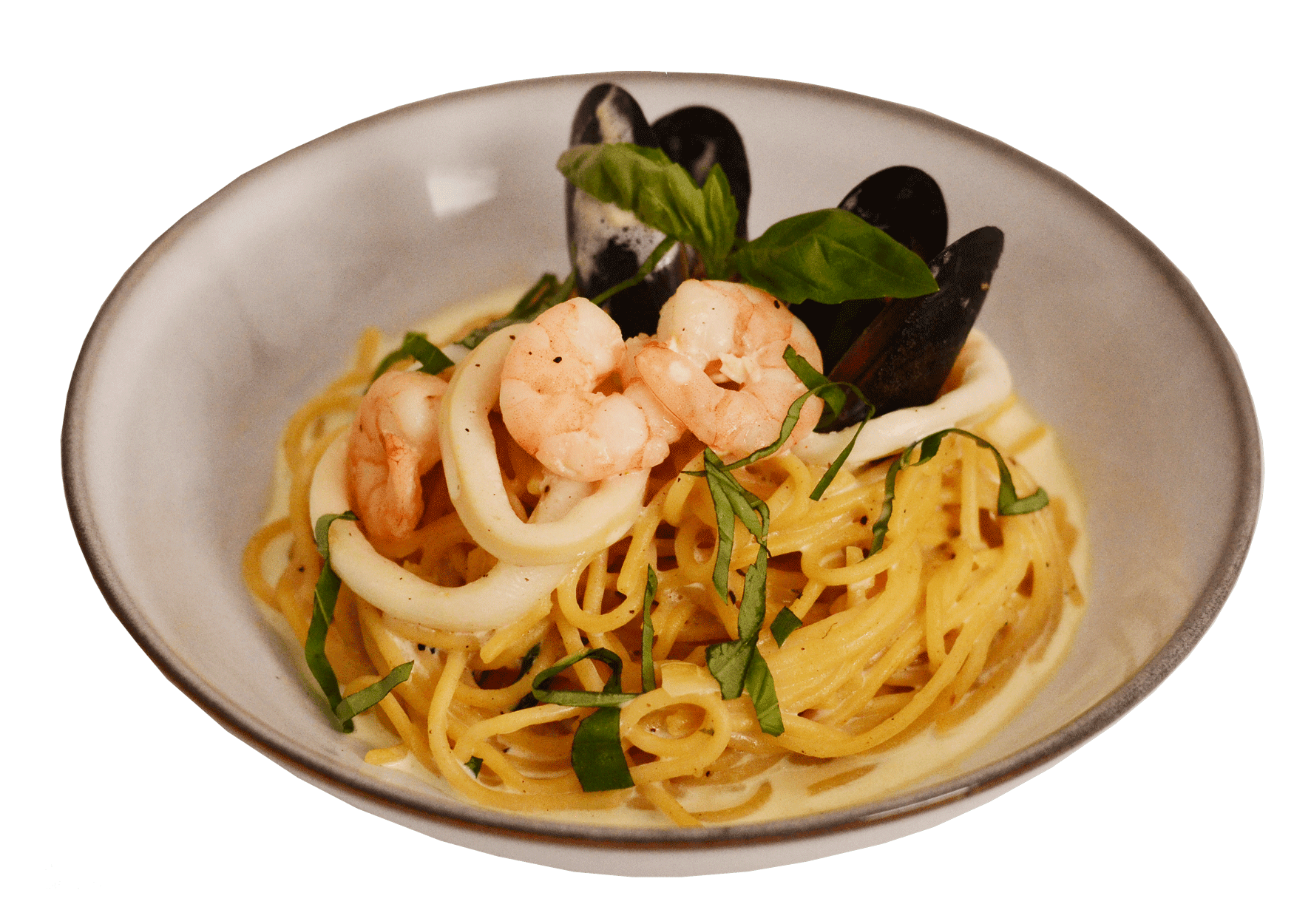idocatering agarlic creamy seafood pasta served on white plate