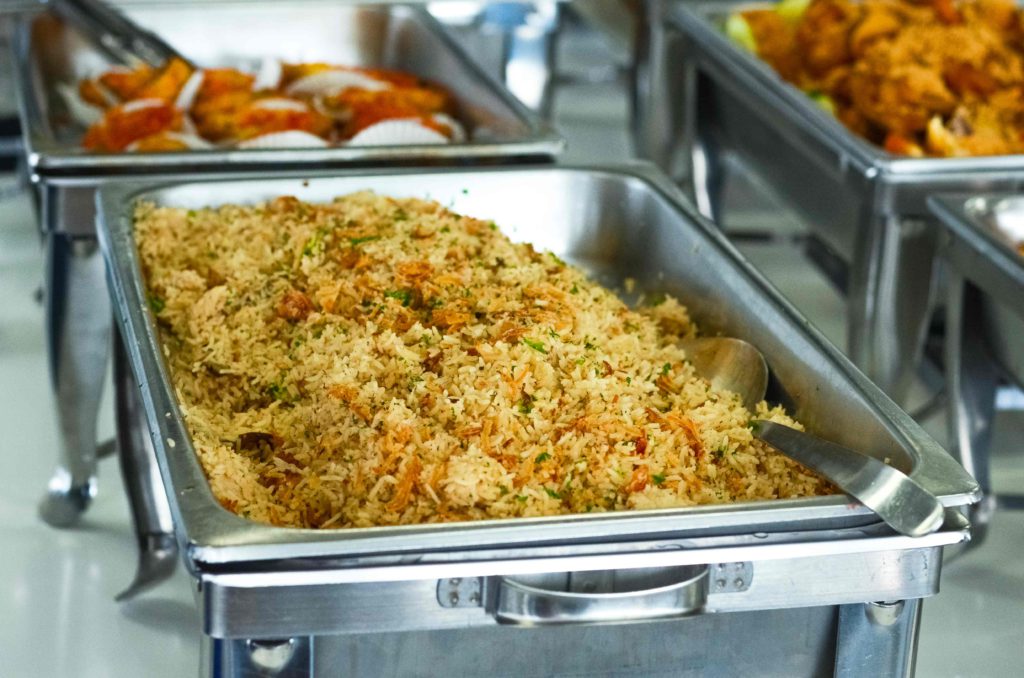 Office Buffet fried rice served in silver tray by idocatering