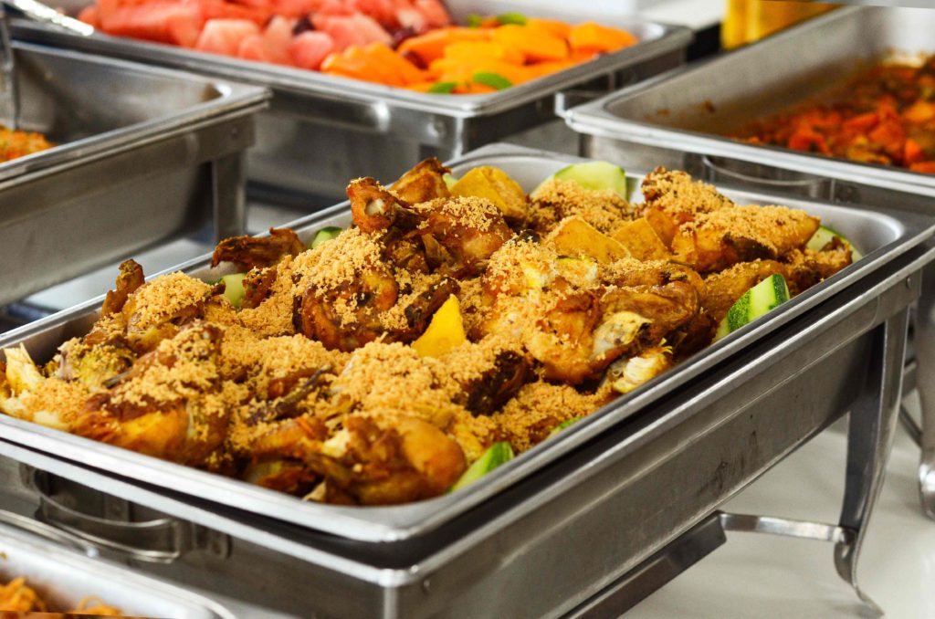 Office Buffet fried chicken served in silver tray by idocatering